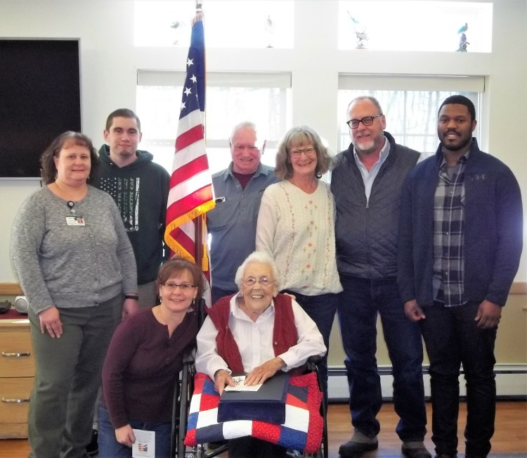 Several family members attended the ceremony for Jean Smith at Lakewood. Front from left are Jody Shields and Jean Smith. Back from left are Mandy Ledger, Jacob Ledger, Doug Farrin, Katie Farrin, Steve Smith and Chris Smith. Jean's granddaughter Mandy works in the business office at Lakewood.