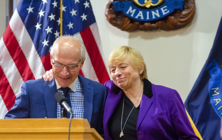 Maine Gov. Janet Mills and Gordon Smith, who is  the state's first director of opioid response. A summit on the issue is scheduled for Monday in Augusta.