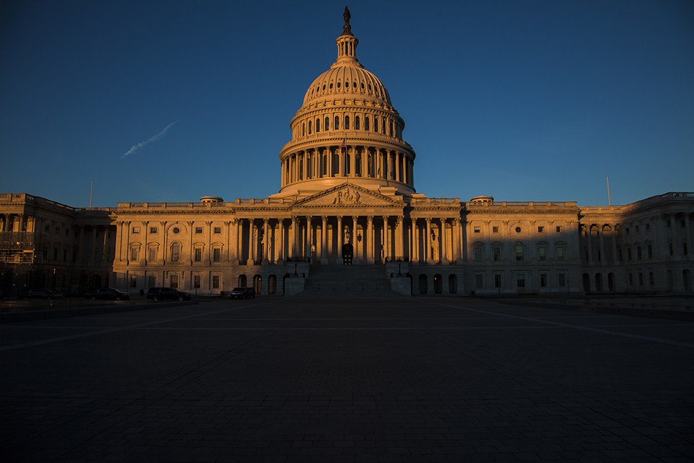 The Capitol is seen at dawn on the 21st day of a partial government shutdown as an impasse continues between President Donald Trump and Democrats on funding his promised wall on the U.S.-Mexico border, in Washington, Friday, Jan. 11, 2019. A new era of divided government began this year with the 116th Congress as the Democrats took control of the House, with Republicans still holding the majority in the Senate. (AP Photo/J. Scott Applewhite)