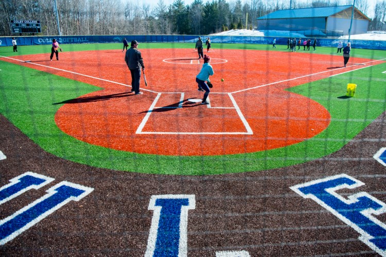 The Waterville Senior High School softball team practices at Colby College in Waterville on Wednesday, March 27.