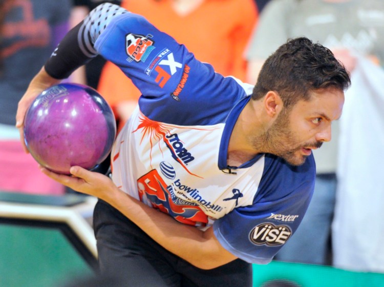 Pro bowler Jason Belmonte, from Austrailia, uses a two handed style of bowling. He'll be in Portland this week for the inaugural PBA Playoffs. (Photo by John Ewing/Staff Photographer)