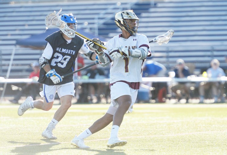 Thornton Academy's CJ LaBreck missed the football season last fall with a shoulder injury, but he is healthy now and ready to lead the Trojans in defense of their Class A lacrosse title.