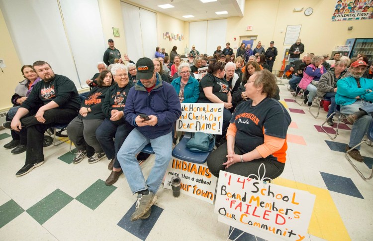 Supporters of the Skowhegan Area High School Indian name fill the cafeteria during a school board meeting at Skowhegan Middle School on Thursday.