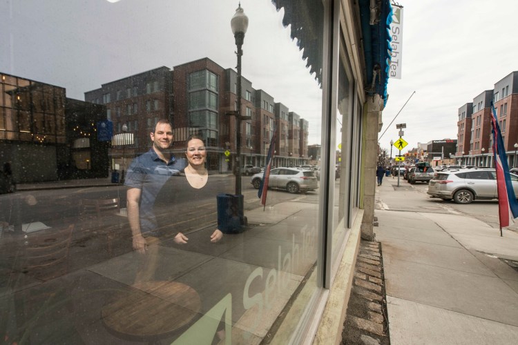 Bobby and Rachel McGee, owners of Selah Tea on Main Street in Waterville, pose Friday in their restaurant. Selah Tea is a beneficiary of Waterville’s Façade and Building Improvement Grant Program.