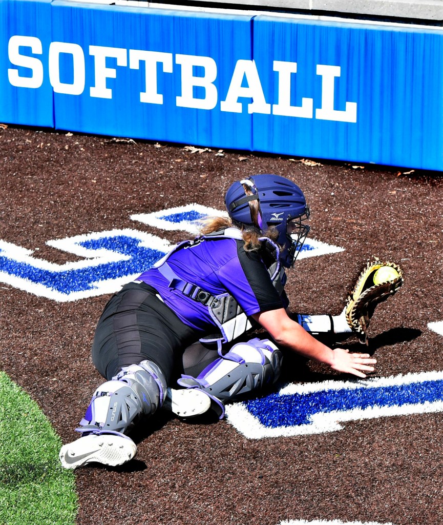 WATERVILLE,  ME-  APRIL 17: Waterville catcher McKayla Nelson catches ball behind home plate during game against Winslow on Wednesday, April 17, 2019. (Morning Sentinel photo by David Leaming/Staff Photographer)