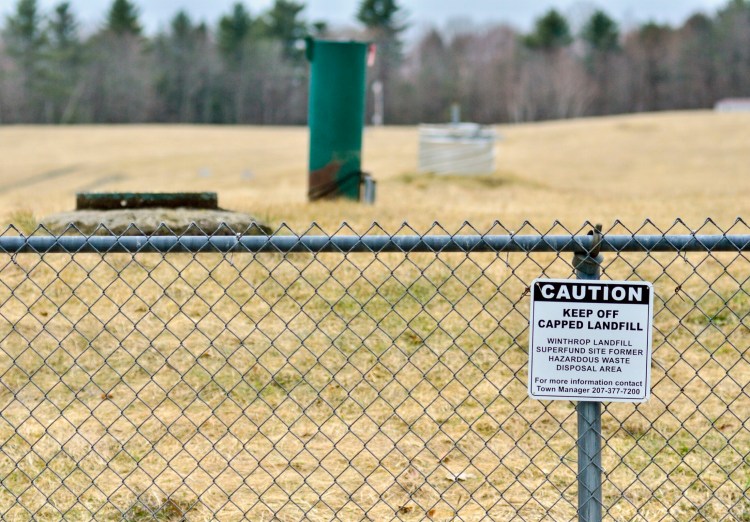 A chain-link fence blocks access to the Winthrop landfill Superfund site, shown Friday.