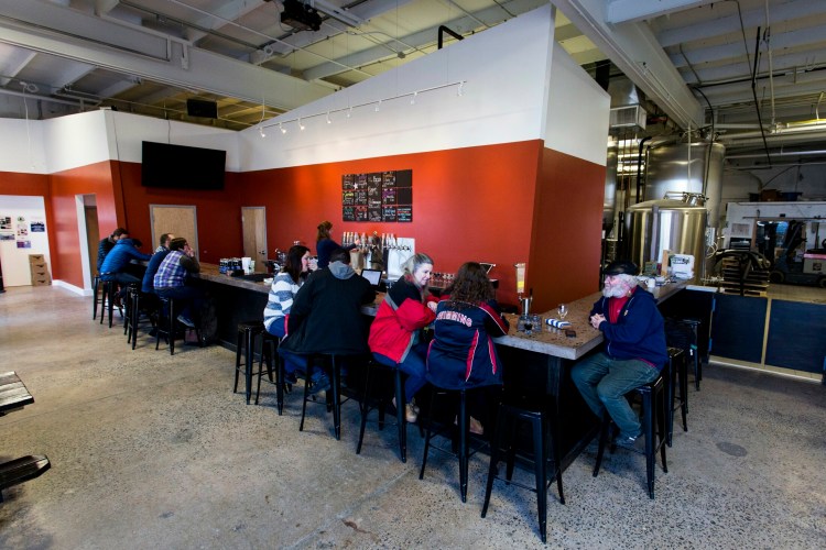Rising Tide Brewing, photographed soon after the expansion of its tasting room in 2016, has operated under a license that allows it to sell gluten-free drinks, such as cider and wine, in addition to its beer. That license requires that 10 percent of the revenue come from food sales. Rising Tide's food sales account for only 9 percent.