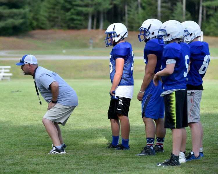 Madison football coach Scott Franzose works through a drill during a 2016 practice in Madison. Franzose is the next football coach at Mt. Blue.