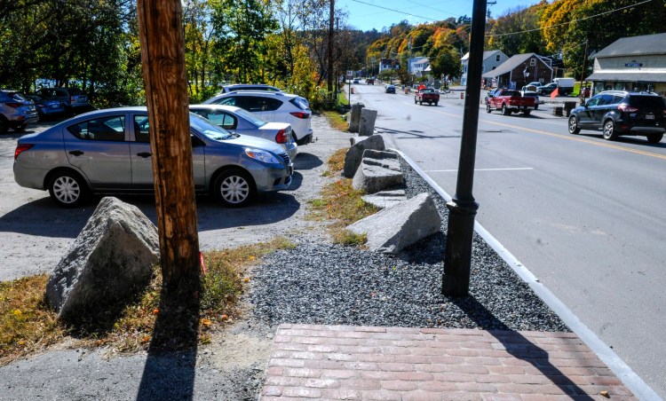 The Water Street sidewalk ends at the Lucky Garden restaurant parking lot, as shown Oct. 22 in downtown Hallowell.