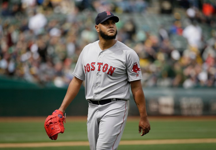 Associated Press/Eric Risberg
Boston Red Sox starting pitcher Eduardo Rodriguez walks to the dugout after being removed in the fourth inning against the Oakland Athletics on Thursday. (AP Photo/Eric Risberg)