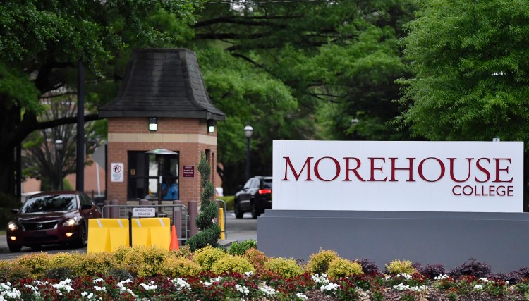 In this Friday, April 12, 2019 photo, people enter the campus of Morehouse College in Atlanta. Morehouse College, the country's only all-male historically black college, will begin admitting transgender men next year. The move marks a major shift for the school at a time when higher education institutions around the nation are adopting more welcoming policies toward LGBT students. 