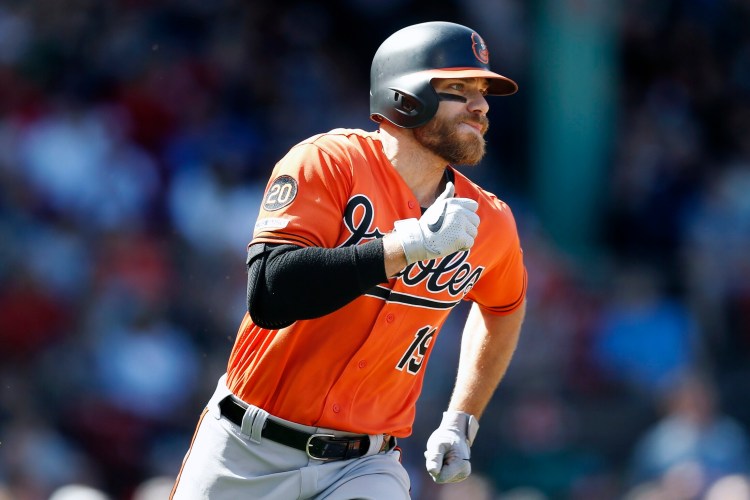 Chris Davis ended his 0 for 54 slump with a two-run single in the first inning, then added an RBI double as the Orioles beat the Red Sox 9-5 on Saturday in Boston.