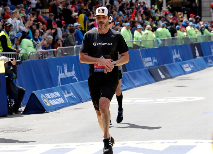 Seven-time NASCAR driver Jimmie Johnson ran his first Boston Marathon on Monday, finishing in 3 hours, 9 minutes, 7 seconds. 