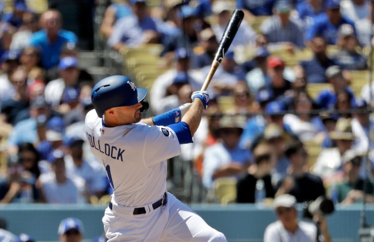 A.J. Pollock of the Dodgers hits a three-run home run off Cincinnati pitcher Sonny Gray in the sixth inning Wednesday.