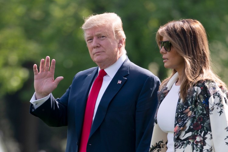 Without taking questions from reporters about the Mueller report, President Trump and first lady Melania Trump walk to board Marine One for the short trip to Joint Base Andrews then on to his estate in Palm Beach, Fla., at the White House in Washington on Thursday.