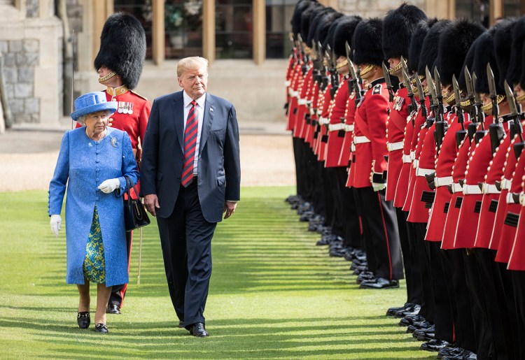 Britain's Queen Elizabeth II and Donald Trump inspect the Guard of Honour, during the president's visit to Windsor Castle in July 2018.