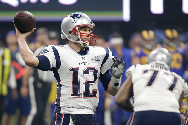 New England Patriots' Tom Brady (12) passes against the Los Angeles Rams during the second half of the NFL Super Bowl 53 football game Sunday, Feb. 3, 2019, in Atlanta. (AP Photo/Mark Humphrey)