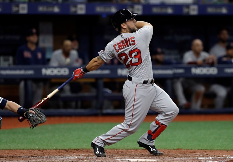 Michael Chavis doubled in his first major league at-bat in the ninth inning of Boston's 6-5 win over the Tampa Bay Rays on Saturday night in St. Petersburg, Floria.