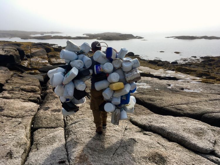 Brian Marcaurelle cleans ocean-borne plastics debris from a Maine island. "The fight to keep the Maine coast free of plastic trash has a hero in Brian Marcaurelle, a champion of sustainable recreation in Maine," his nomination for a 2019 Source Award said. In 2018, he oversaw efforts to remove more than 1,200 bags of garbage from Maine islands. 