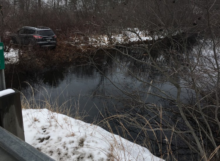 Police say this SUV went off West Road in Waterboro, hit boulders lining a river and flew about 25 to 30 feet, landing on the other side.