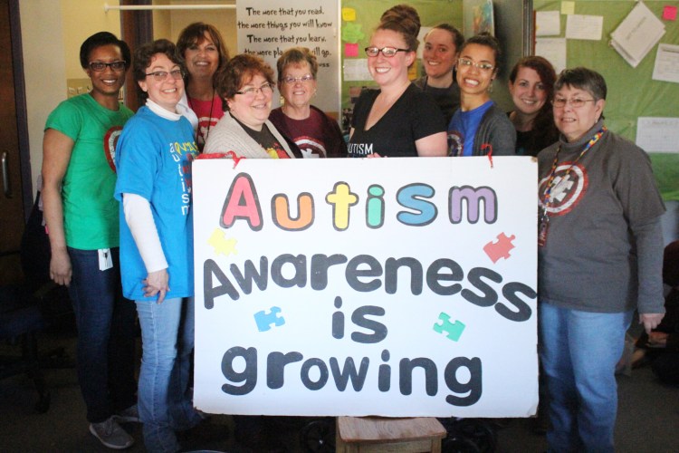 Winslow Elementary School  teachers and facilitators recognize that Autism awareness is growing. In front from left are Samantha Lessard, Joan Brown, Kelsey Steeves, Rachel Leak and Peg Pellerin.
Back from left are Nicole DeRoche, Anne Rice, Joan Varney, Anna Collins and Melissa Hanley, head of the Autism Program at the school.
 