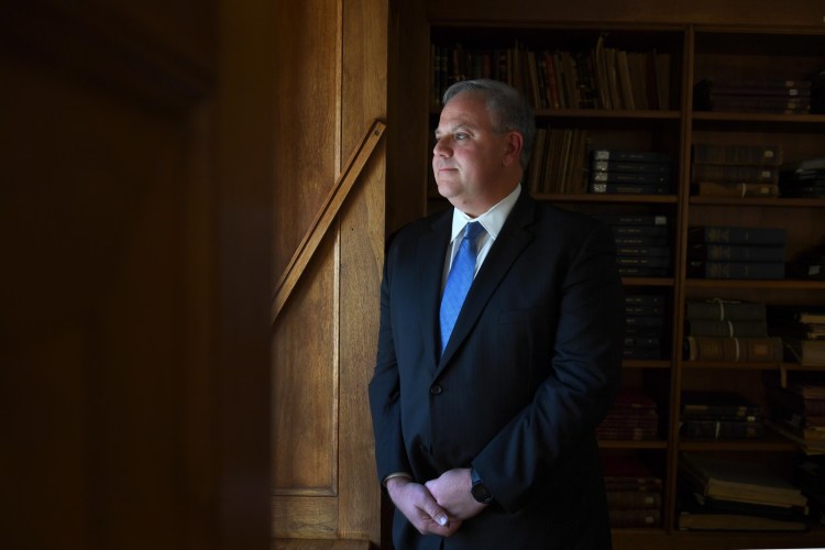 David Bernhardt, then-deputy secretary of the interior, is shown in the library at the Department of the Interior in October 2018 in Washington. The Senate confirmed Bernhardt's nomination to lead the department permanently Thursday. 