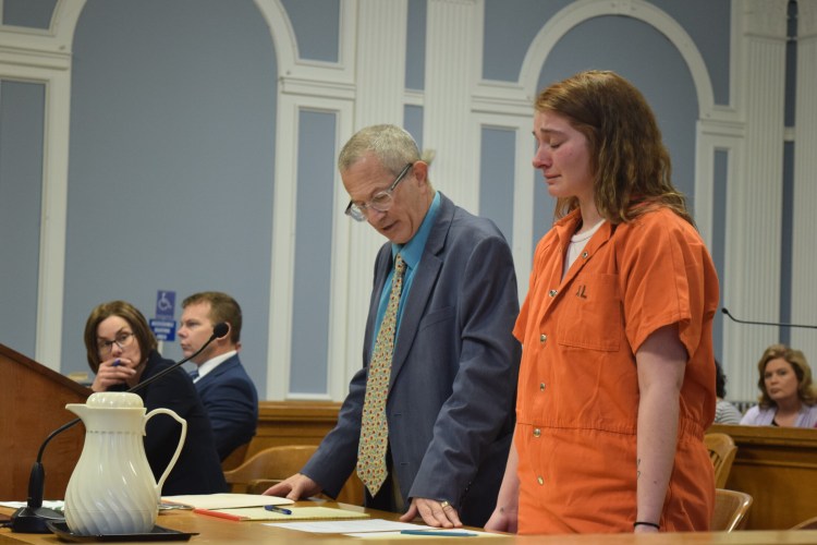 Savannah Smith stands next to her attorney, Jeffrey Silverstein, during a bail hearing Monday.