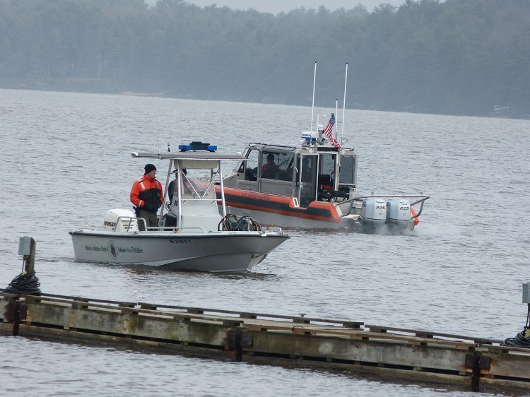 Maine Marine Patrol and U.S. Coast Guard boats and personnel patrol the Kennebec River Friday looking for a 35-year-old man who authorities believe fell into the water Thursday night. 