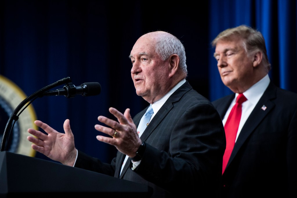 Secretary of Agriculture Sonny Perdue, left, and President Trump.