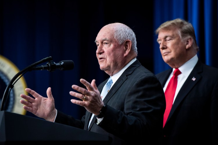Secretary of Agriculture Sonny Perdue, left, and President Trump plan to relocate hundreds of scientific researchers with the USDA.