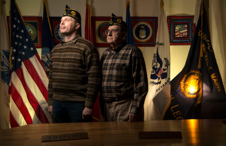 Craig Bailey, Commander of Legion Post #5, left, and Pearley Lachance, Legion Chaplain, right, pose for a picture at the American Legion Post #5 on Drummond Avenue in Waterville in March before a fundraiser that had the dual purpose of raising funds and publicizing their organization. 