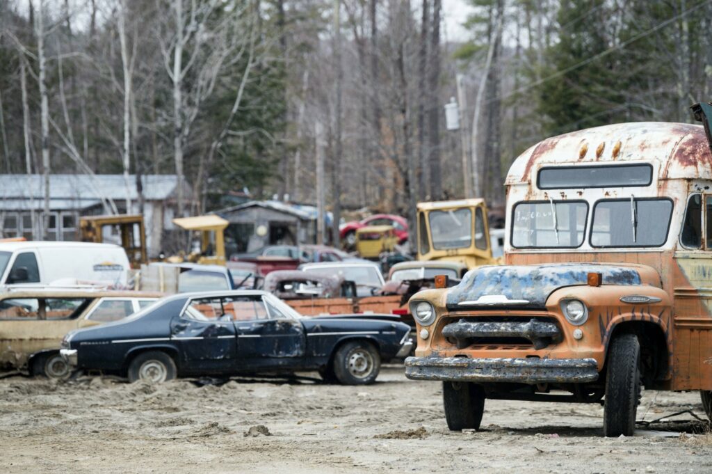 The town of Rome and Larry and Janet DiPietro, the owners of an unlicensed junkyard and automobile graveyard, have settled a two-year-old dispute.