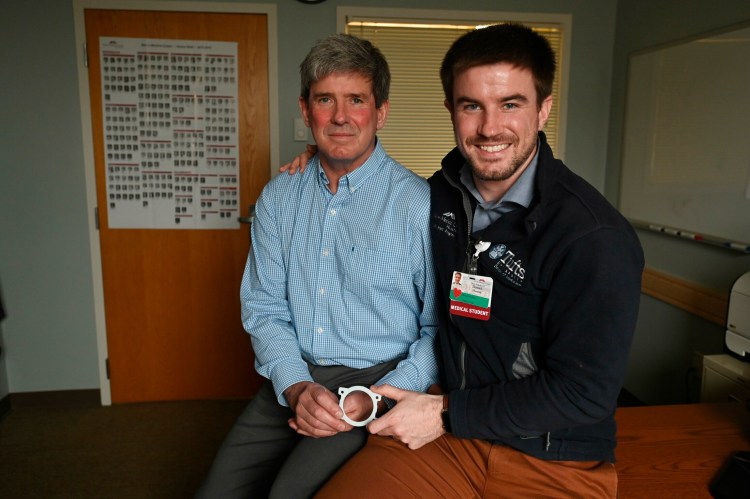 Dan Hussey, right, a medical student who invented a device with his father to increase the mobility of ostomy bag users, was inspired by his dad's medical problems.