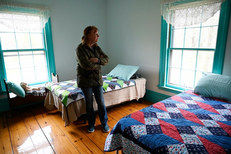 Susan Austin, the assistant superintendent for SAD 60, shows a bedroom of the Ryan Home, which she helped create to provide a home to some of the rising number of homeless students in the Berwick area.  