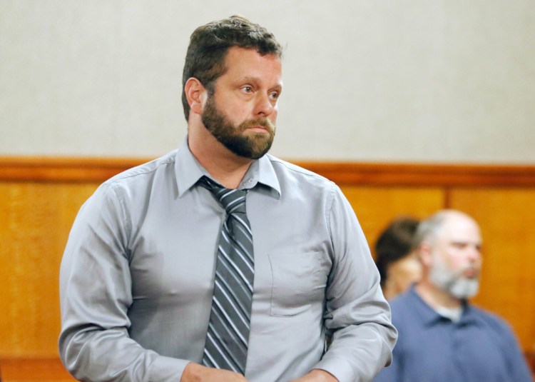 Shawn Purvis stands in court in May 2019 during his arraignment on charges in the death of a worker who fell from the roof of a house on Munjoy Hill in December 2018.