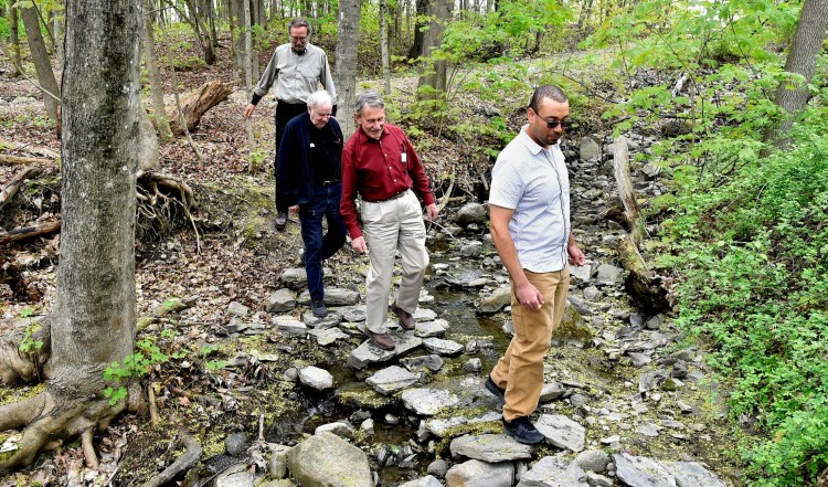 The Oxbow Trail in Waterville will receive a cleaning on Saturday, June 1, National Trails Day. Walking along the trail off Cool Street in Waterville from left are Jim Shipsky, Elery Keene, Peter Garrett and Ash Hekmat.  