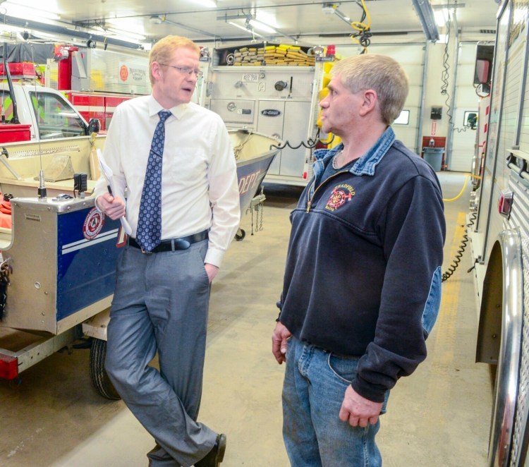 Readfield Town Manager Eric Dyer, left, and Fire Chief Lee Tank talk during a tour of the Readfield Fire Department's Harriman Station on May 23 in Readfield. A plan for an expansion of the station is on the upcoming ballot.