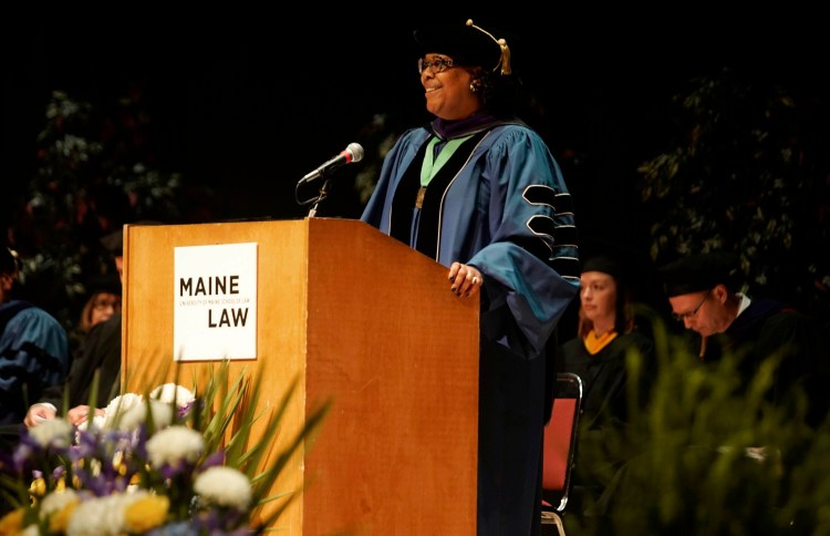 University of Maine School of Law's Dean Danielle Conway speaks at the commencement ceremony on Saturday. The graduation was Conway's last as the dean. 