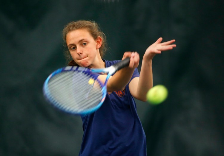 Isabel Berman of Cape Elizabeth hits a return during her 6-3, 6-2 win over Gabby Blanco of Winthrop in the state singles tournament. Berman was eliminated in the Round of 32 by Morgan Warner of Waynflete.