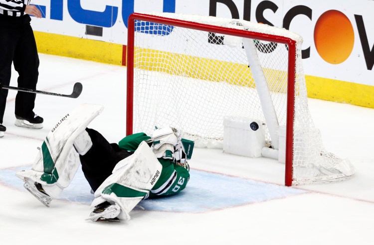 Stars goalie Ben Bishop lies on the ice as a shot gets past him and into the net during Dallas' 4-1 loss to the St. Louis Blues in Game 6 of their Western Conference semifinal series on Sunday in Dallas. The Blues forced Game 7 with the win. 