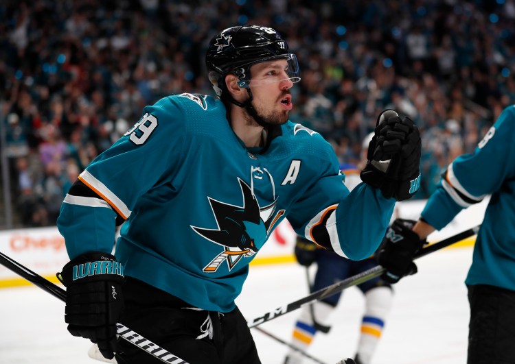 San Jose's Logan Couture scored twice and did everything in between to help the Sharks beat the St. Louis Blues 6-3 on Saturday in Game 1 of the Western Conference finals.