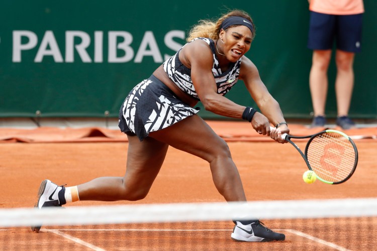 Serena Williams plays a shot against Vitalia Diatchenko during their first round match at the French Open on Mondayat the Roland Garros stadium in Paris. Williams won 2-6, 6-1, 6-0.