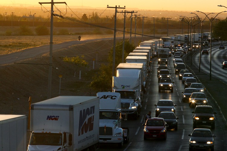 Trucks wait to cross the border with the U.S. in Ciudad Juarez, Mexico in April.