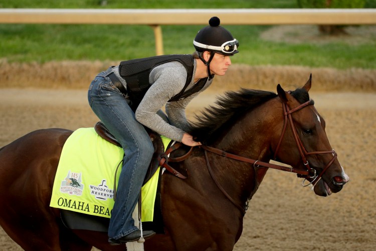 Exercise rider Taylor Cambra rides Kentucky Derby entrant Omaha Beach during a workout at Churchill Downs Wednesday in Louisville, Ky. Omaha Beach, the favorite to win the race, was scratched because of a breathing problem.