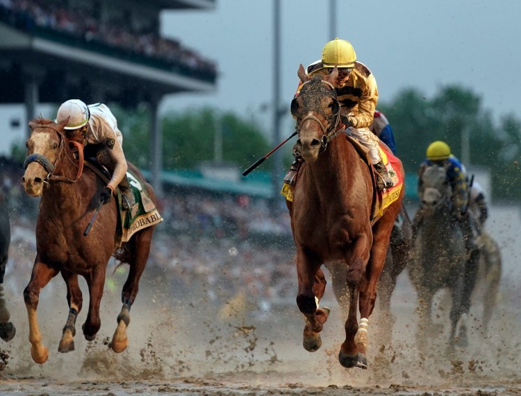 Flavien Prat rides Country House to the finish line during the 145th running of the Kentucky Derby on Saturday at Churchill Downs  in Louisville, Ky. Country House, the Kentucky Derby winner after Maximum Security was disqualified, will not run in the Preakness.