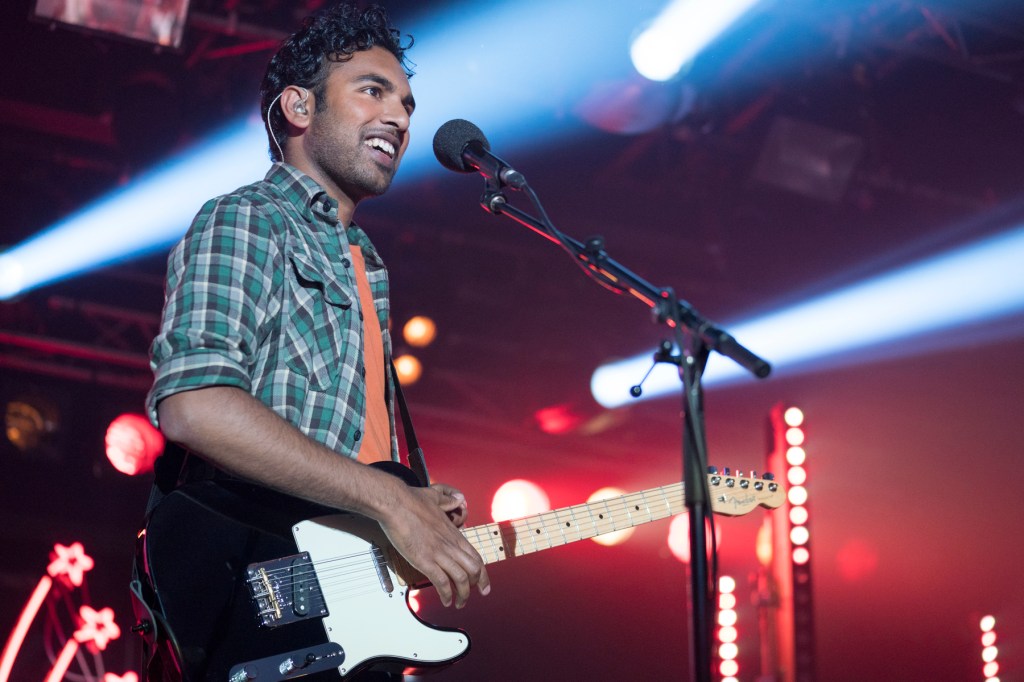 This image released by Universal Pictures shows Himesh Patel in a scene from "Yesterday."