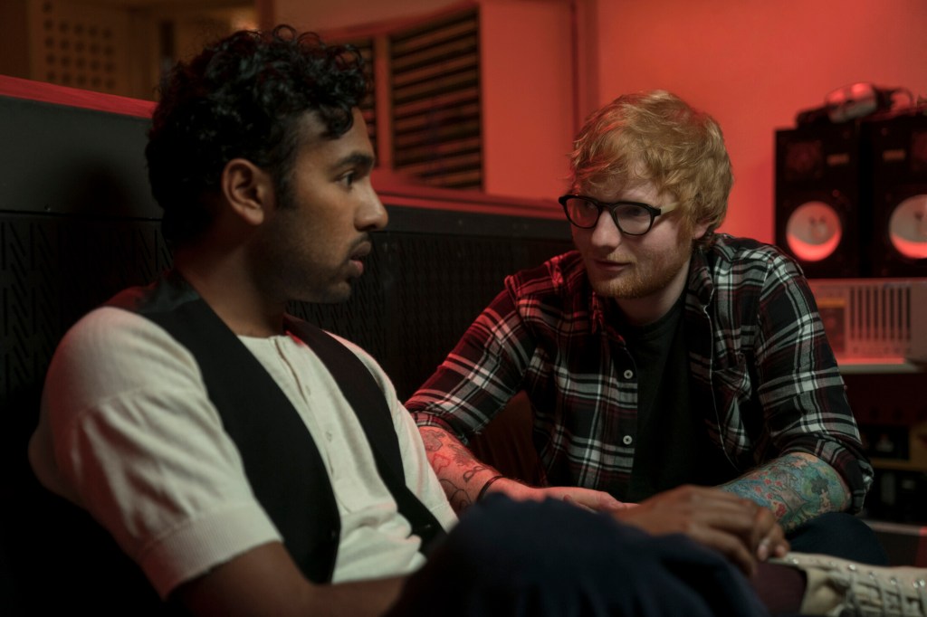This image released by Universal Pictures shows Himesh Patel, left, and Ed Sheeran in a scene from "Yesterday." 