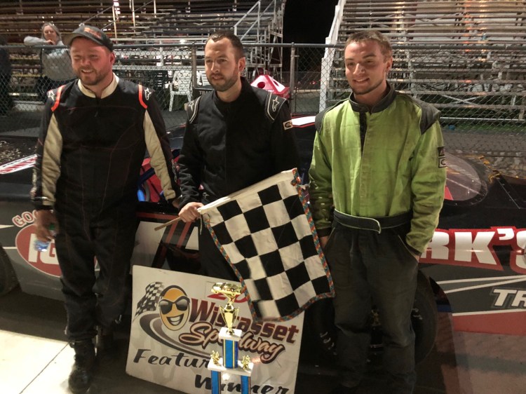 Late Model feature winner Chris Thorne of Sidney, center, is flanked by Josh St. Clair of Liberty, left, and Jake Hendsbee of Whitefield in victory lane at Wiscasset Speedway back in May. Thorne is virtually assured of winning a fifth career championship with one race remaining in the season.