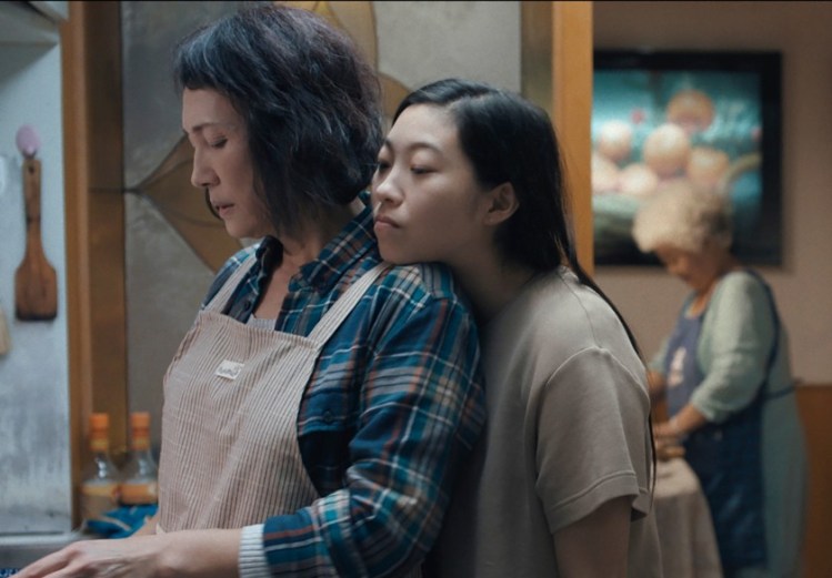 Diana Lin, left, and Awkwafina in a scene from the film “The Farewell.”