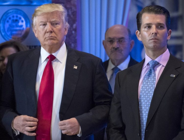 President Trump appears with Donald Trump Jr. in 2018. The Senate Intelligence Committee has subpoenaed Trump Jr. as part of its investigation into Russia's interference in the 2016 U.S. presidential election.